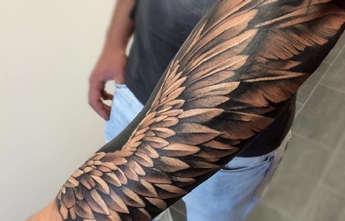 Feathers Half-Sleeve Tattoo