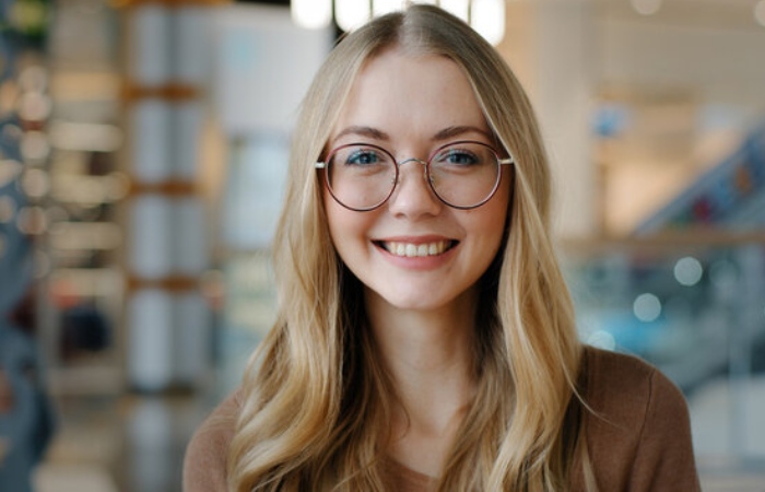 Long Blonde Hair and Round Glasses