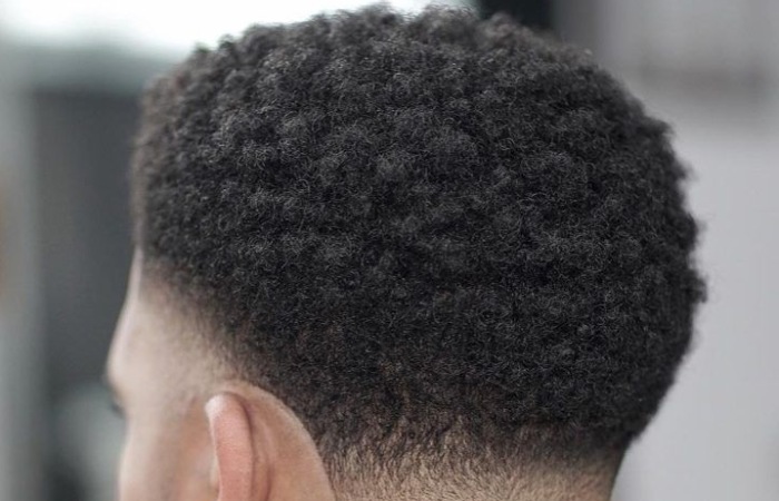 #7. Textured Afro Taper Mid Fade